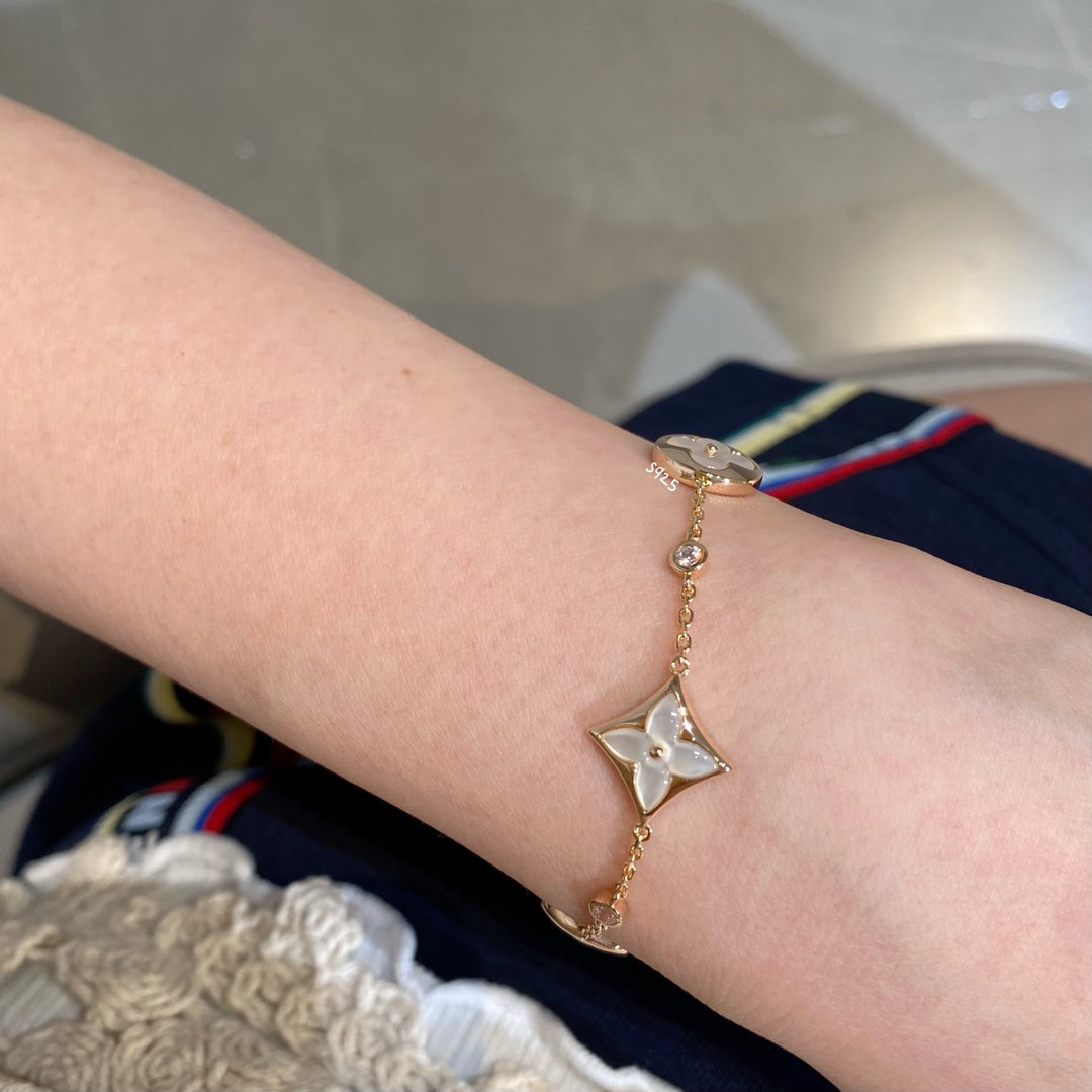 [Love More]STAR AND SUN 4 MOTIF WHITE MOP PINK GOLD BRACELET