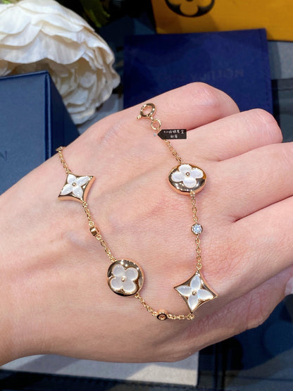 [Love More]STAR AND SUN 4 MOTIF WHITE MOP PINK GOLD BRACELET